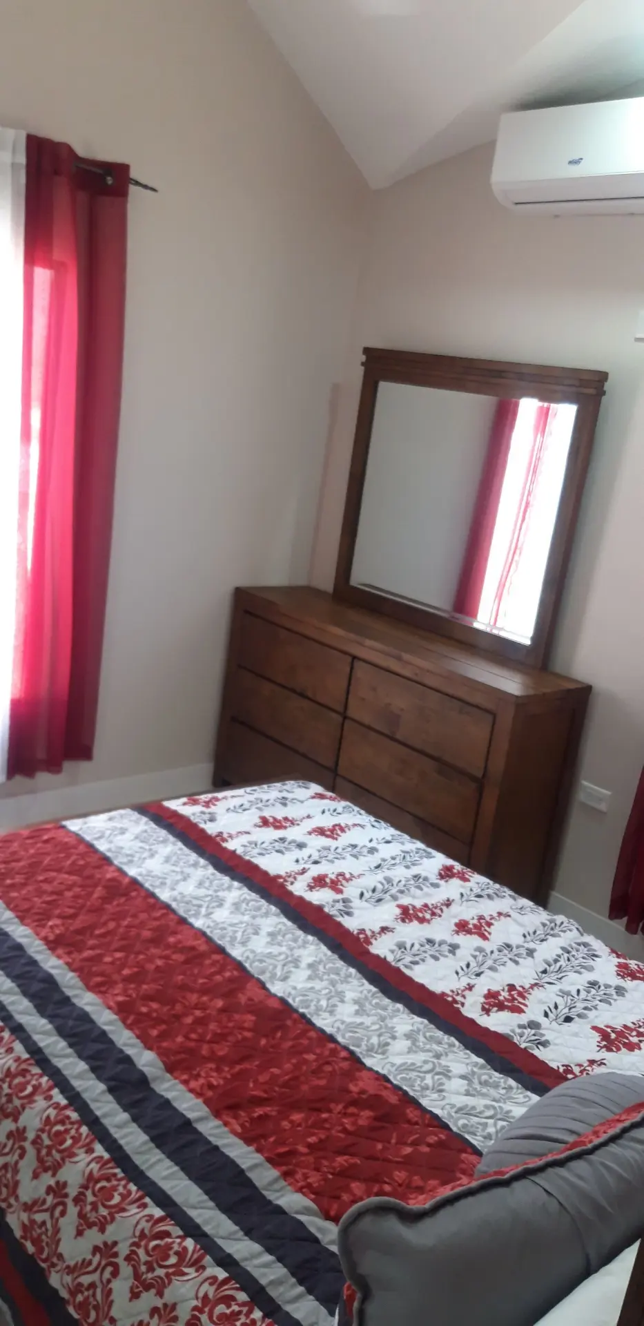 Finished bedroom with air conditioning and interior furnishings